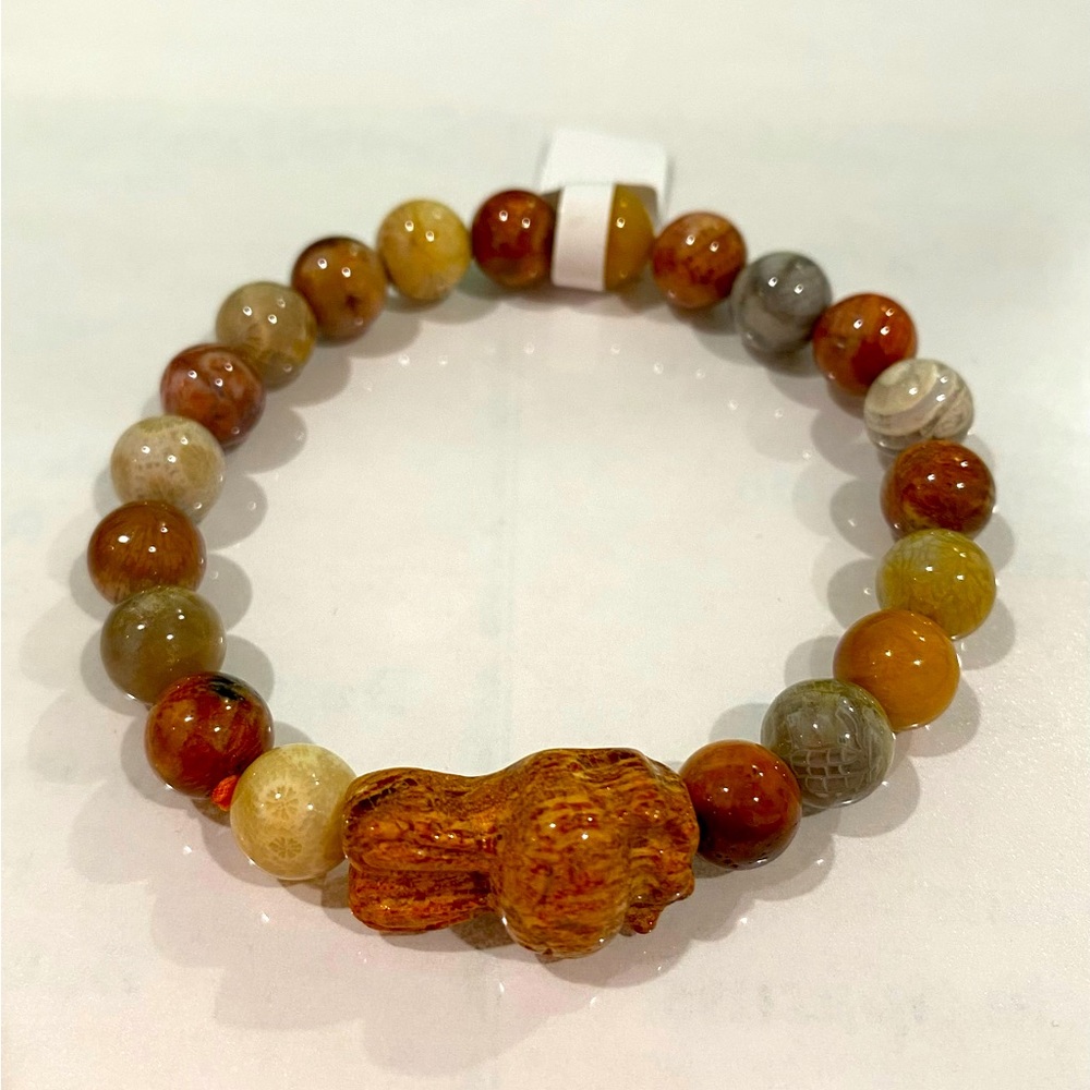 Coral Jade with Carved Rabbit gemstone